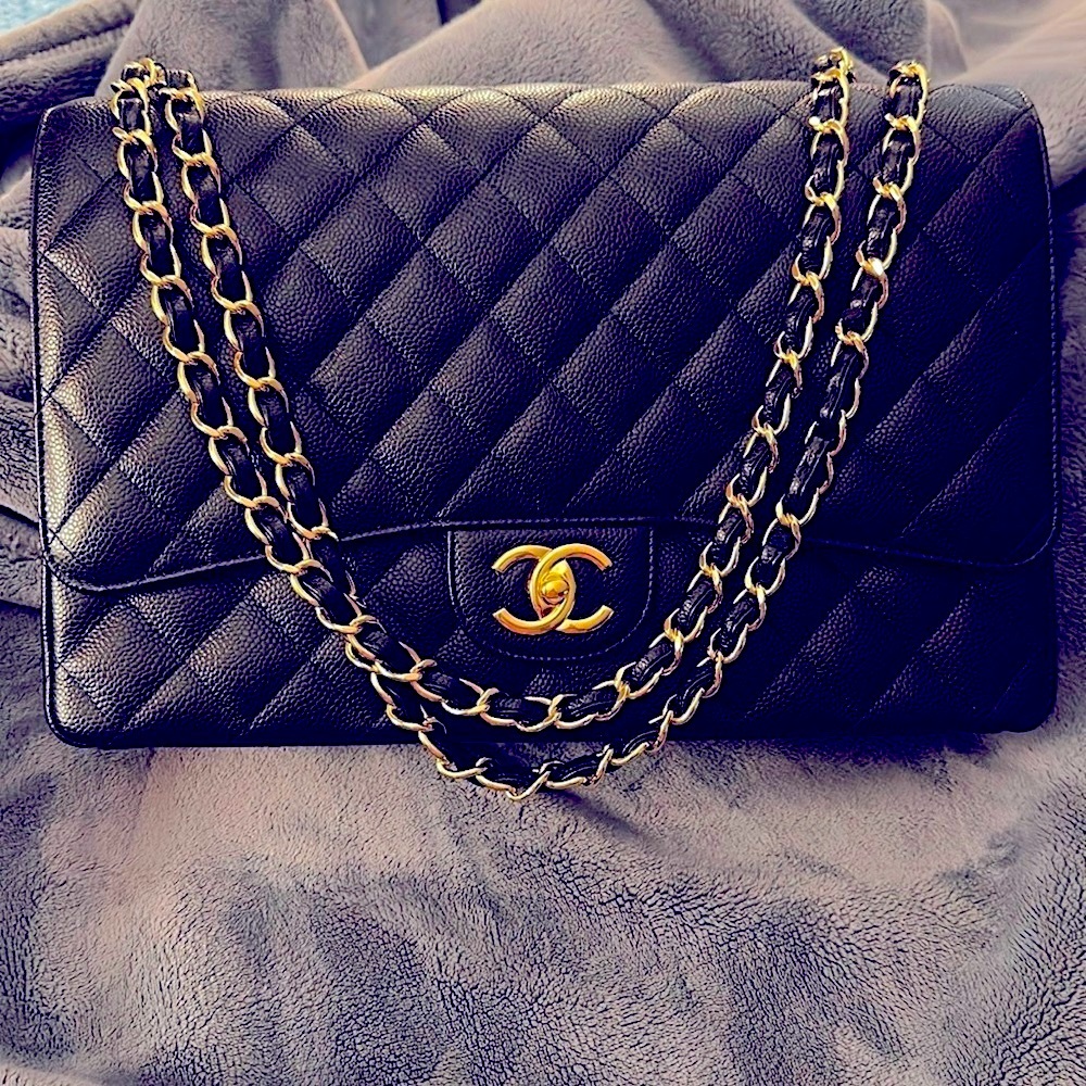 .. Chanel Maxi Classic Double Flap